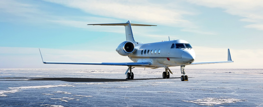 Business jet on a winter airfield highlighting operational and maintenance challenges