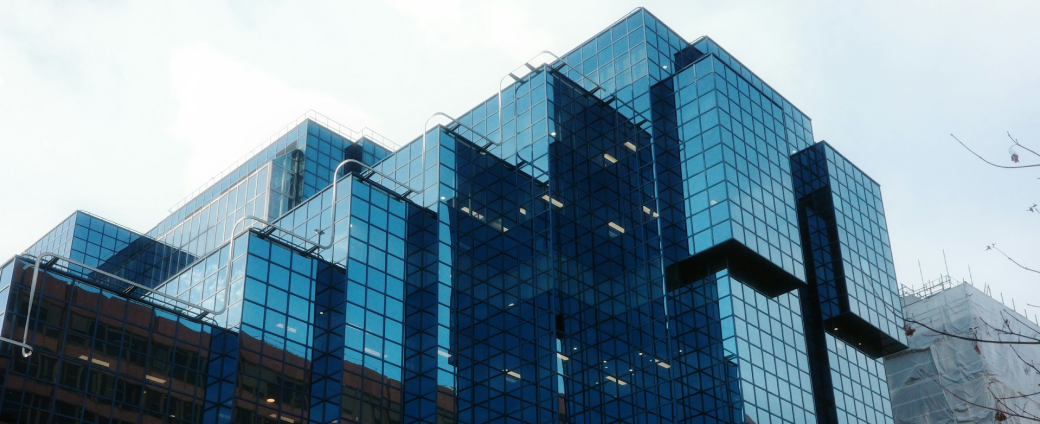 Modern glass office building exterior representing aviation business operations 7tag Avia